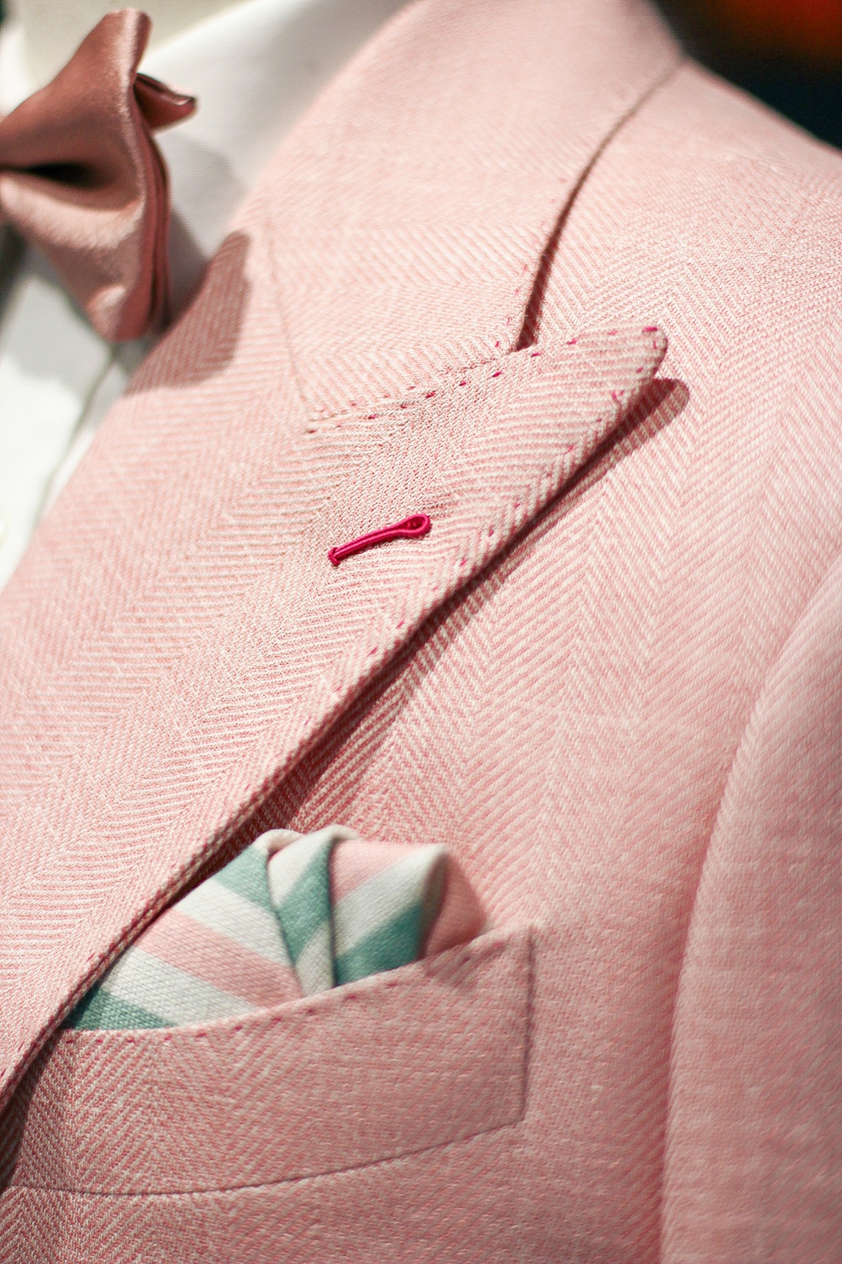 A sharp double-breasted cut and peak lapels